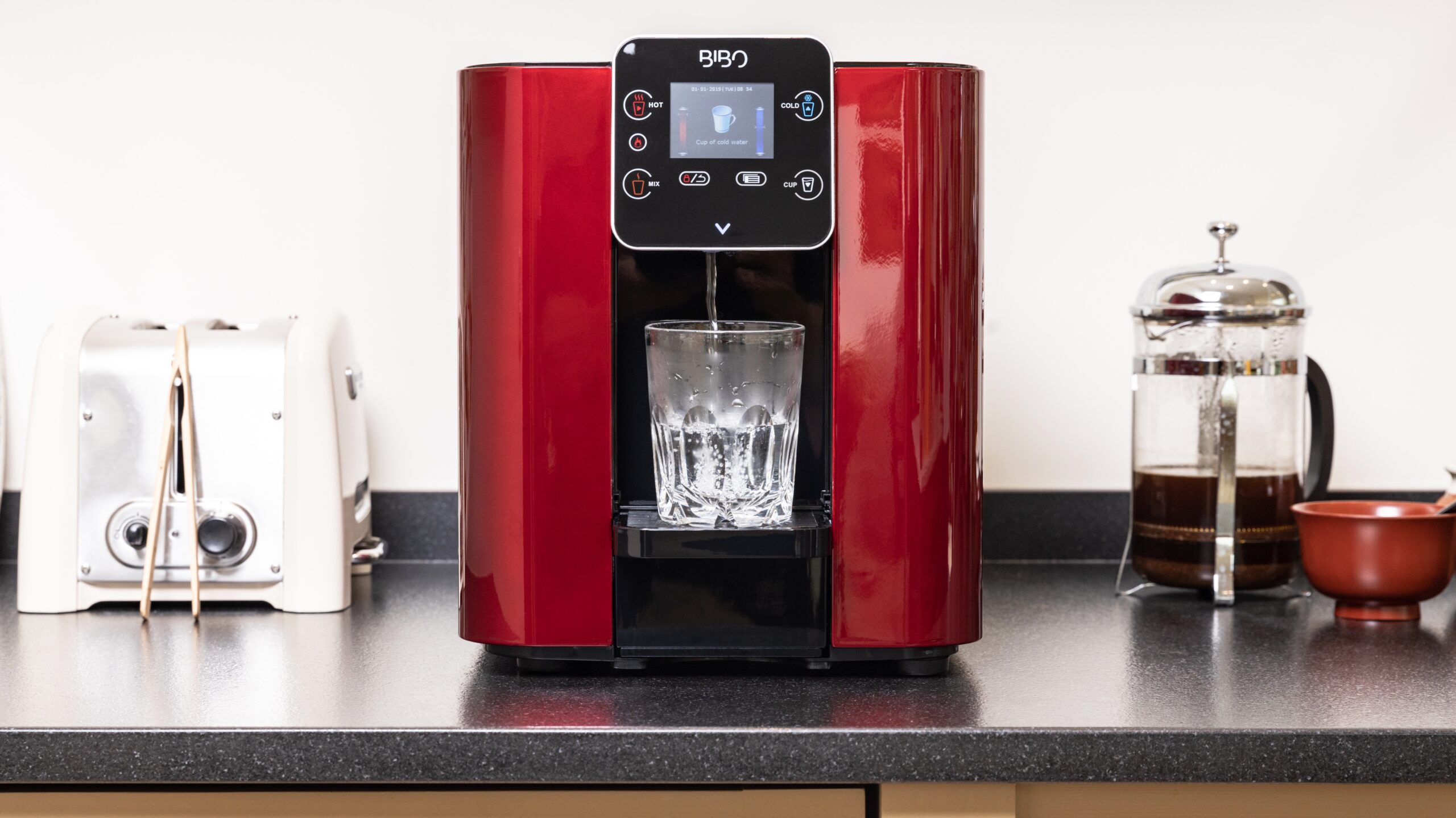 BIBO-WATER-BAR-ON-KITCHEN-COUNTER-TOP-WITH-GLASS-OF-WATER