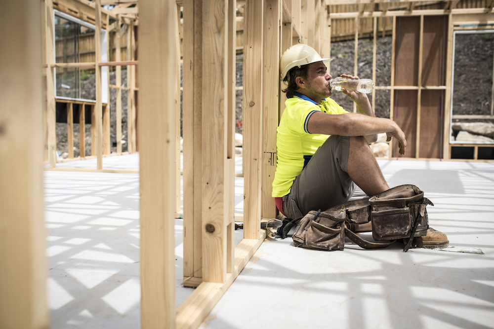 W2W Construction worker drinking water