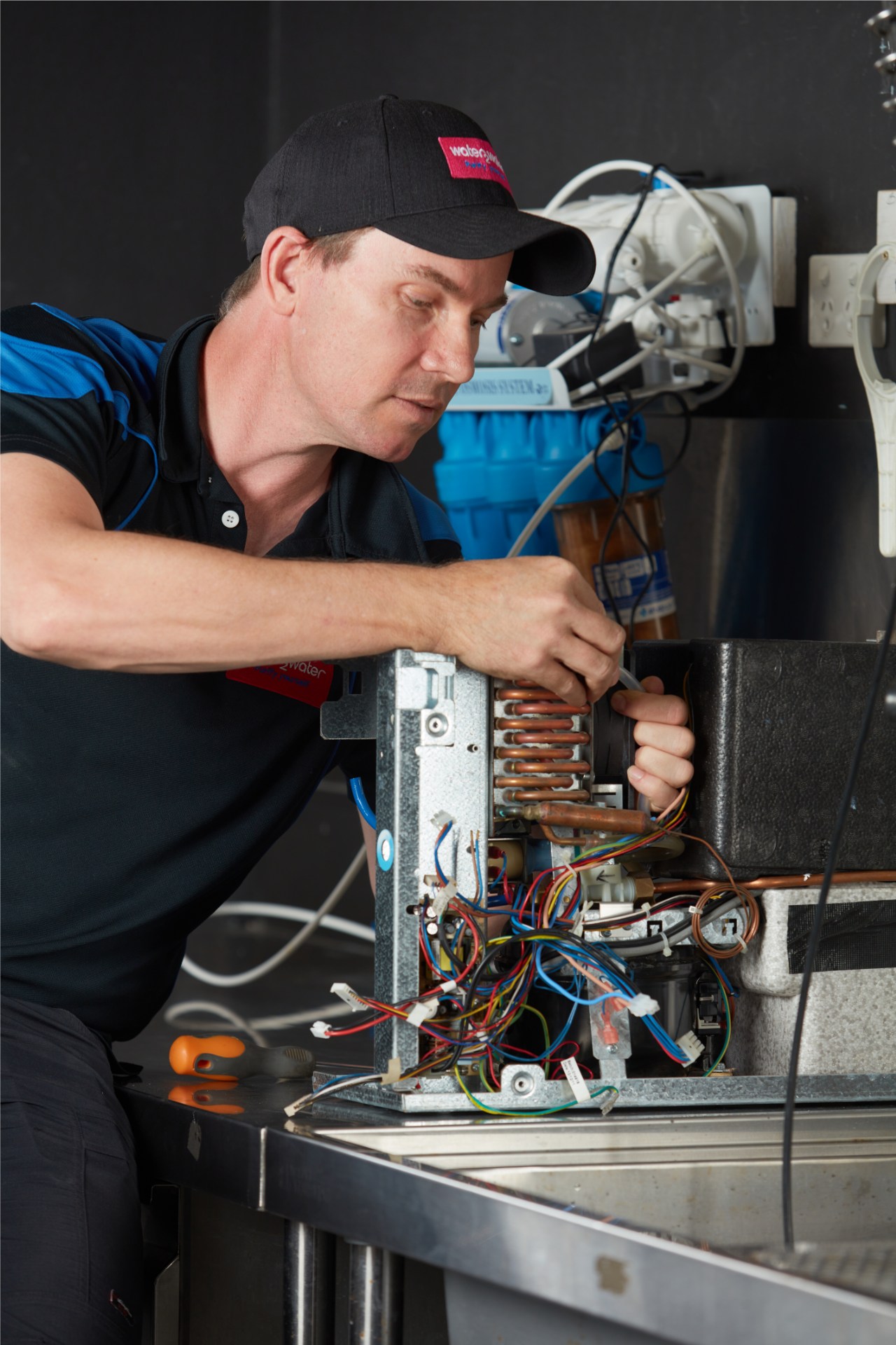 W2W-WATER-FILTRATION-TECHNICIAN-WORKING-ON-INDUSTRIAL-REVERSE-OSMOSIS-SYSTE