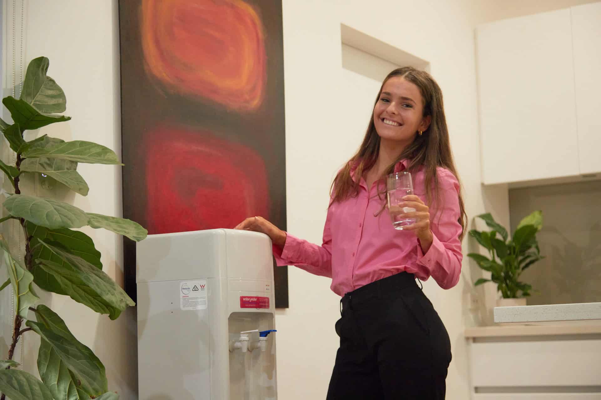 W2W-EMPLOYEE-AT-WATER-COOLER