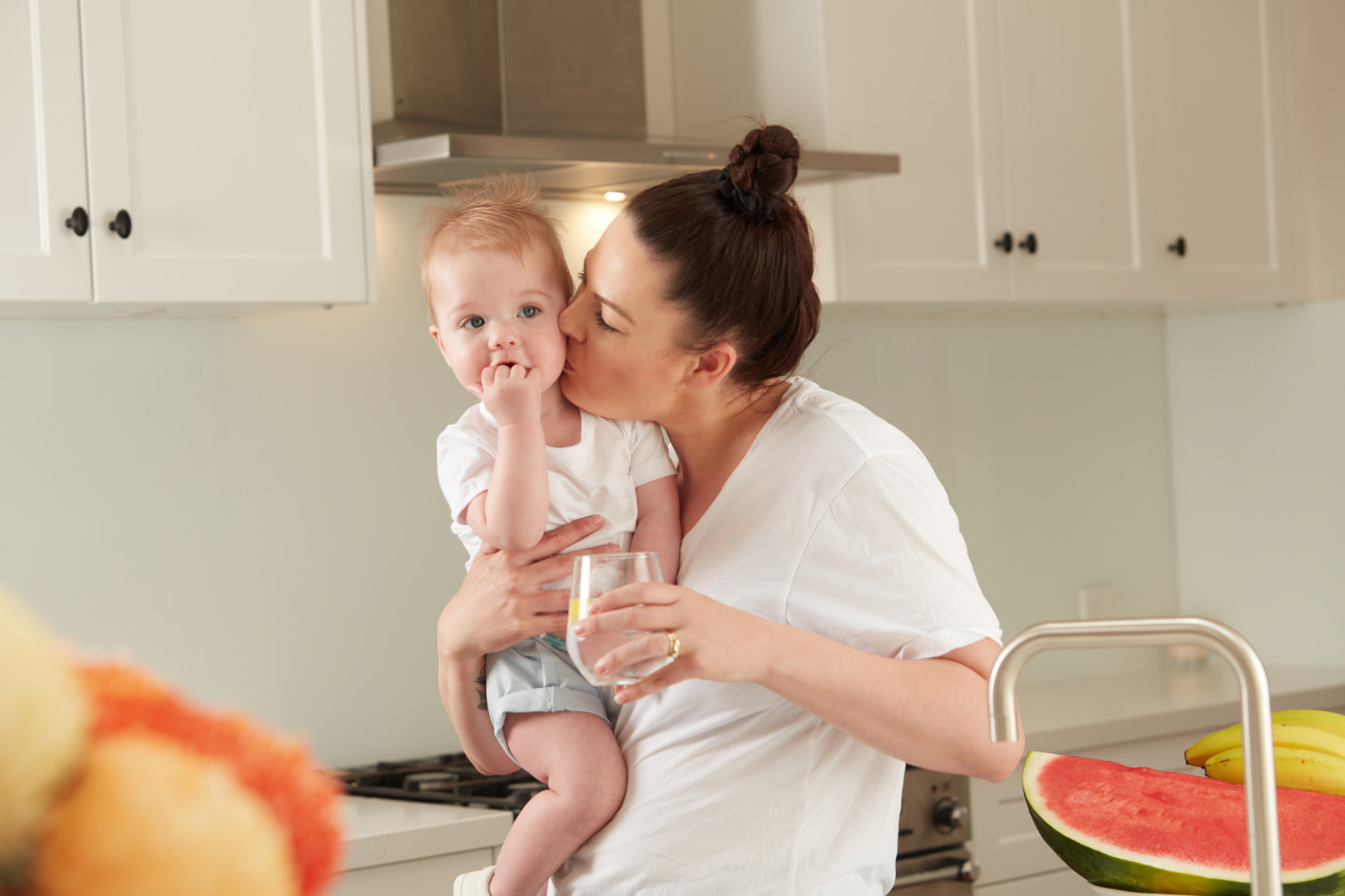 W2W-Lifestyle-Baby-Customer-Drinking-Water-in-Kitchen